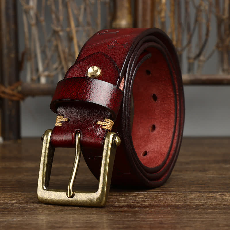oscar | embossed leather belt with single prong buckle