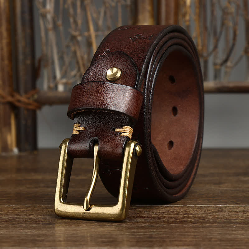 oscar | embossed leather belt with single prong buckle